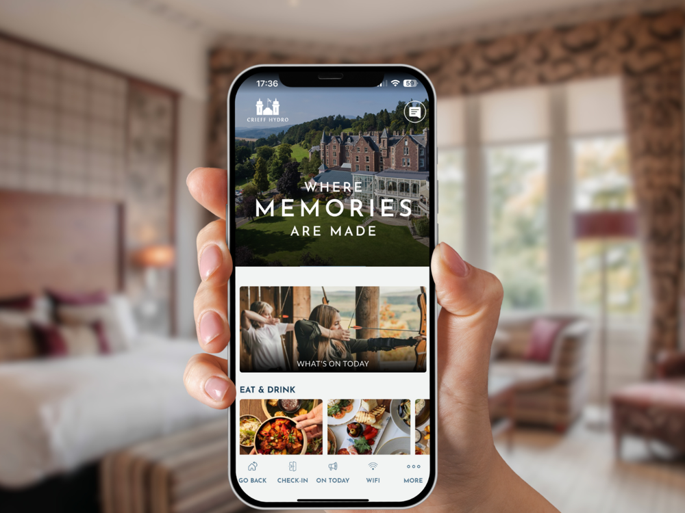 A phone with the Crieff Hydro Family of Apps on it